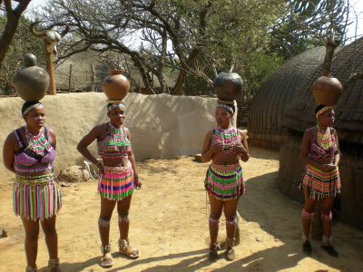 Zulu single women carrying water on head